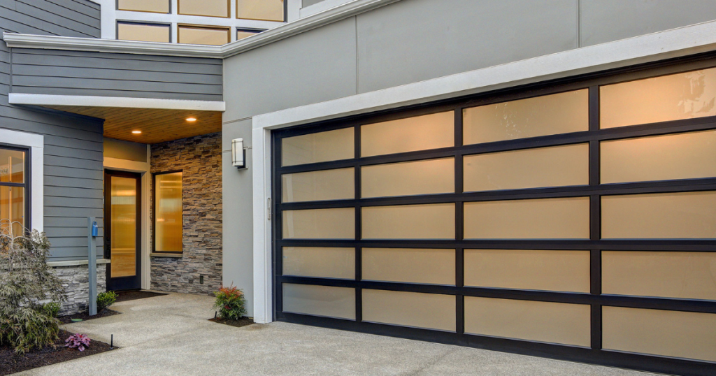 Modern home with frosted glass garage door.